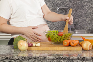 Dollarphotoclub 82544193 300x200 - Asian pregnancy woman cooking salad in the kitchen